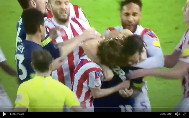 Bradley Johnson bites Joe Allen during Stoke vs Derby