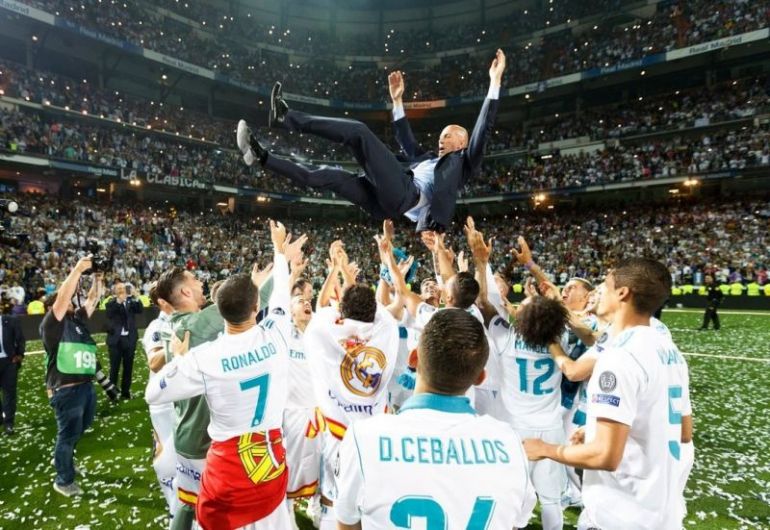 Zidane-being-thrown-up-into-the-air-after-leading-Madrid-to-a-third-consecutive-Champions-League-trophy
