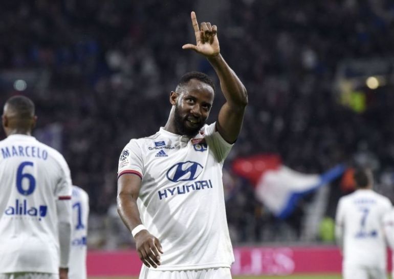 Dembele-celebrating-a-goal-for-Lyon