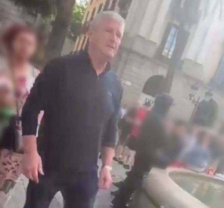 This man was filmed pushing two men into a water fountain in Barcelona