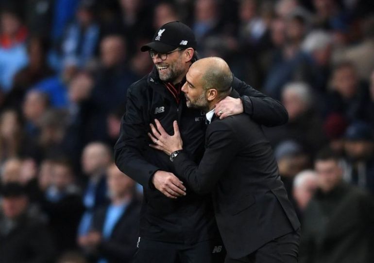 Klopp-and-Guardiola-hugging-each-other