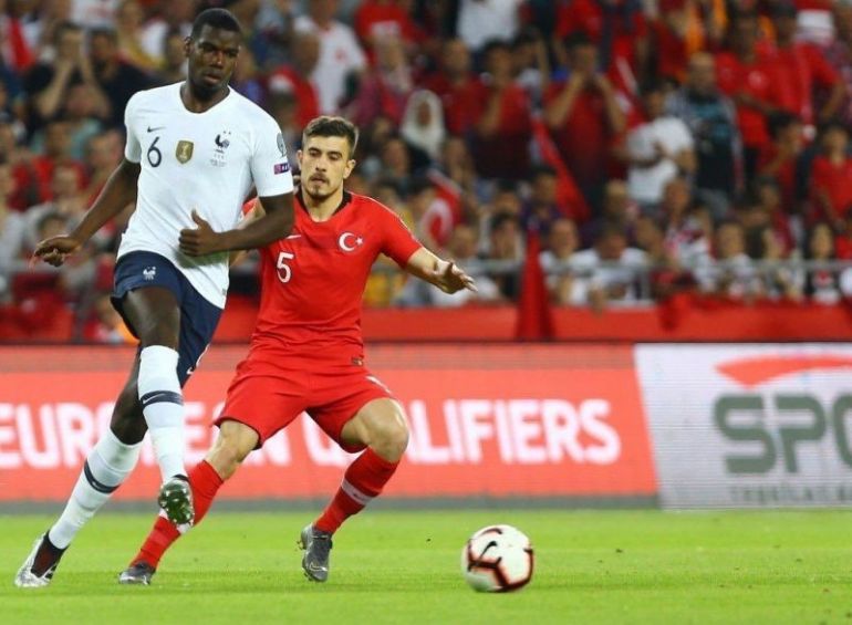 Tokoz-battling-Paul-Pogba-during-Turkey-vs-France