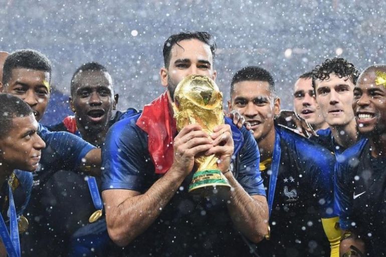 Rami-with-World-Cup-for-France