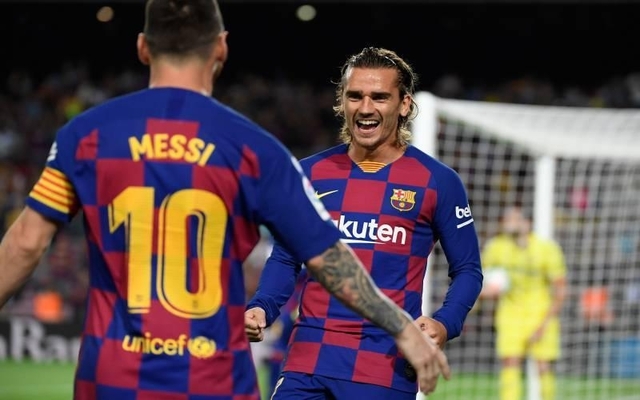 Griezmann-and-Messi-celebrate-for-Barcelona