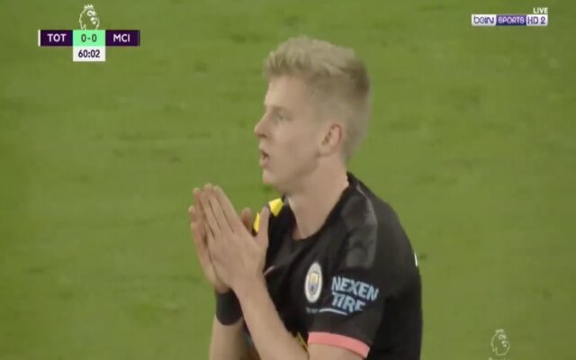 Oleksandr Zinchenko pleads with the referee after being shown his second yellow card against Tottenham