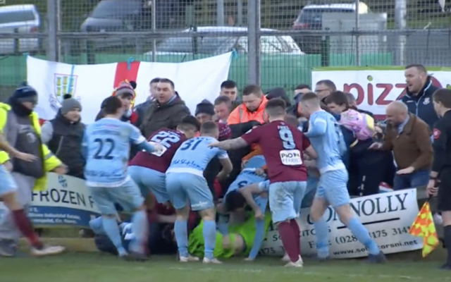 Fence collapses following mass brawl between players and fans in the Northern Irish Cup match between Warrenpoint Town and Ballymena United