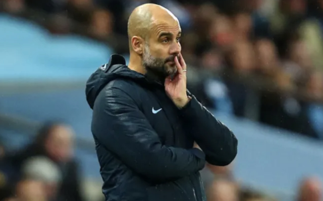 Pep Guardiola looks on worryingly from the sideline