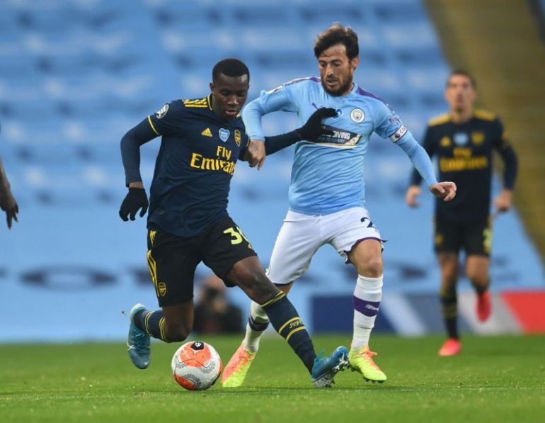 Nketiah battles against Man City's David Silva