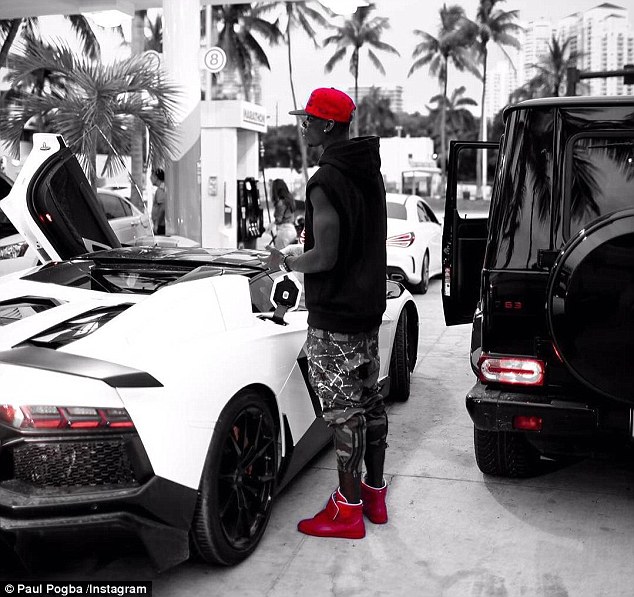 pogba red hat and shoes