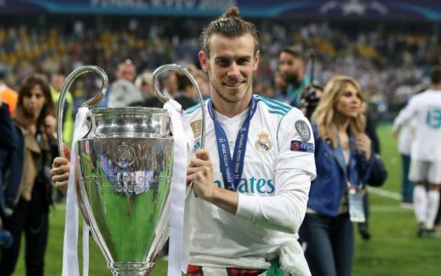 bale with champions league trophy