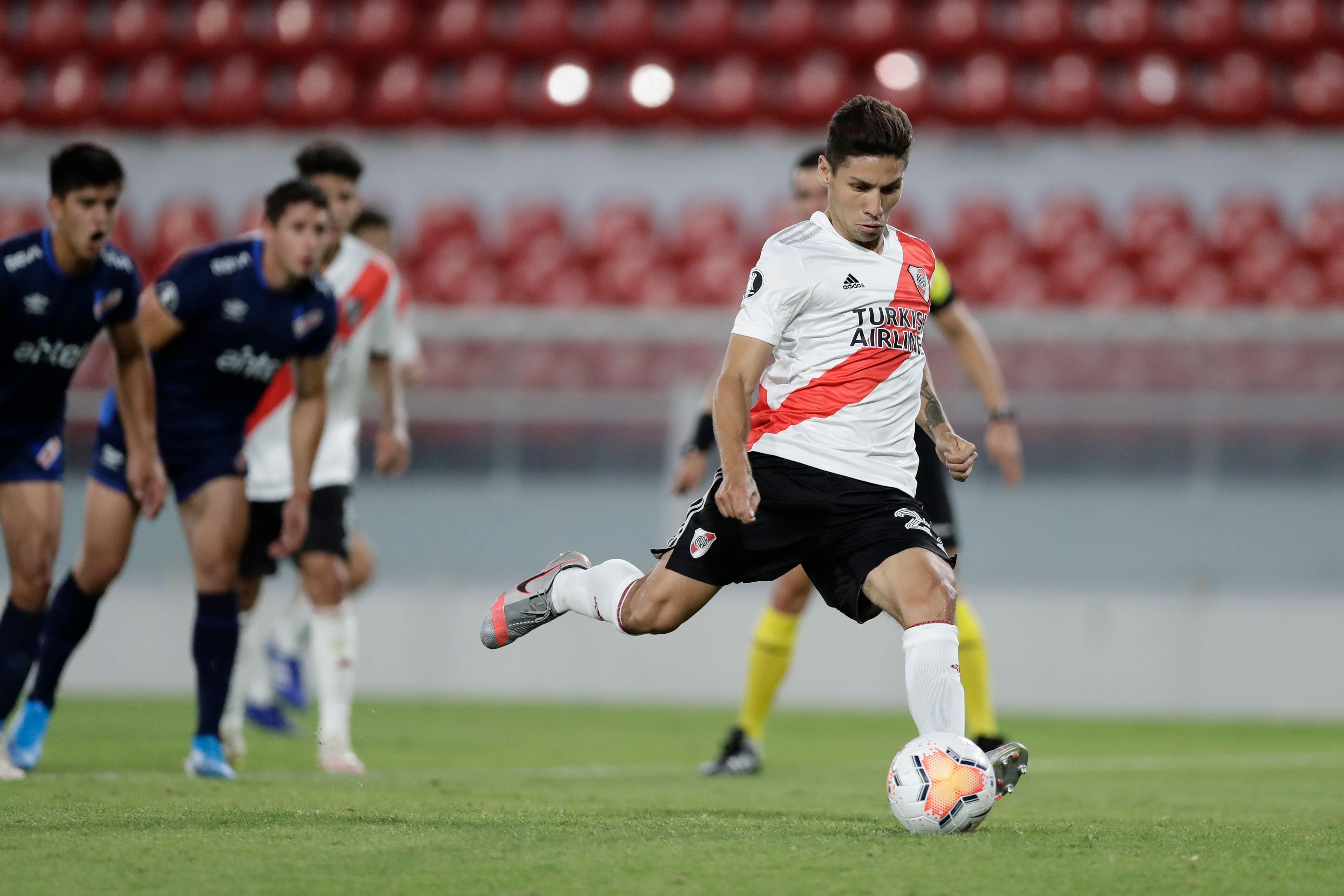 Gonzalo Montiel of Argentina's River Plate heads the ball during a