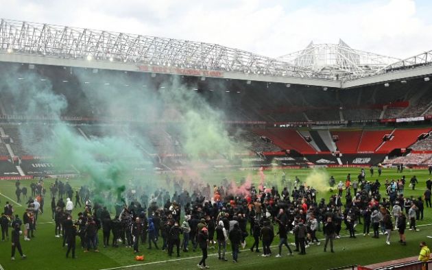 Fans on Old Trafford pitch