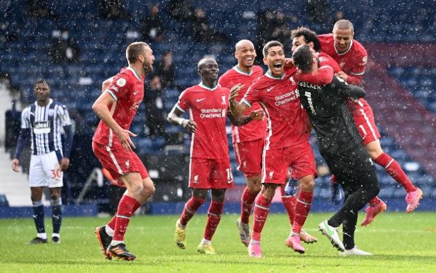 Liverpool players celebrate with Alisson