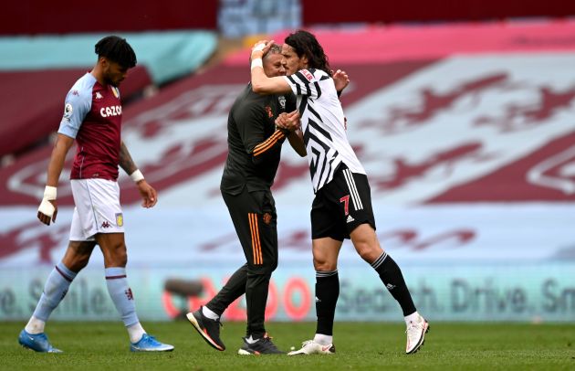 Solskjaer hugs Cavani after win against Aston Villa