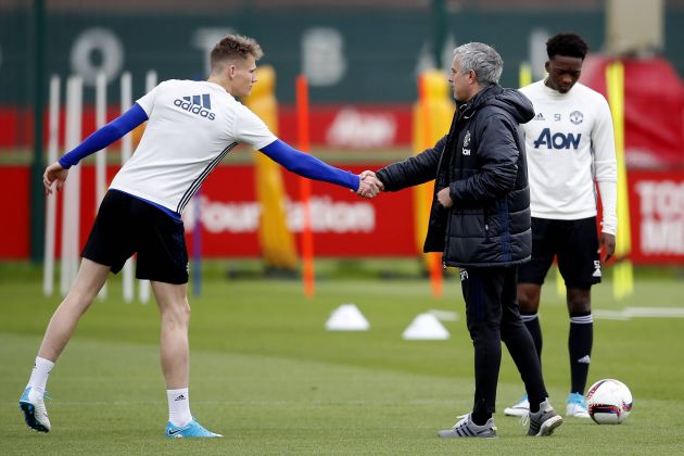 Jose Mourinho and Scott McTominay in Man United training