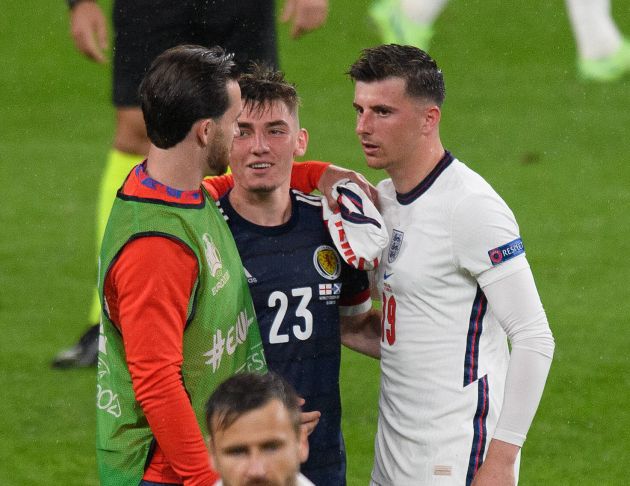 Mount, Chilwell and Gilmour hug after England vs Scotland