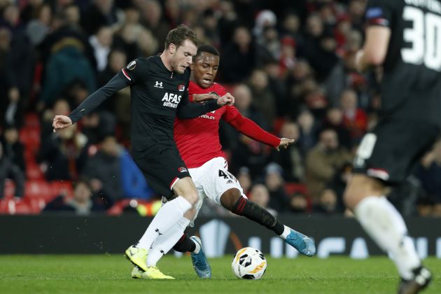 Ethan Laird in Europa League action for Manchester United