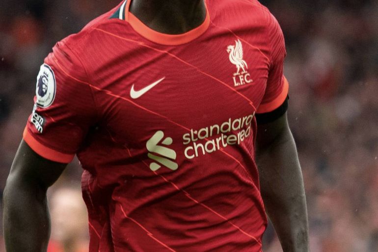 Liverpool FC 'stained' by sponsorship deal with China cheerleader Standard  Chartered