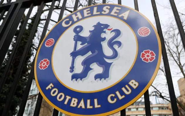 Chelsea badge on a gate