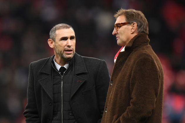 Martin Keown and Tony Adams in discussion on the pitch