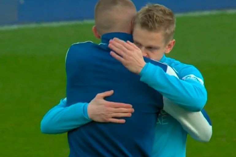 Ukraine stars Zinchenko and Mykolenko hug before PL game