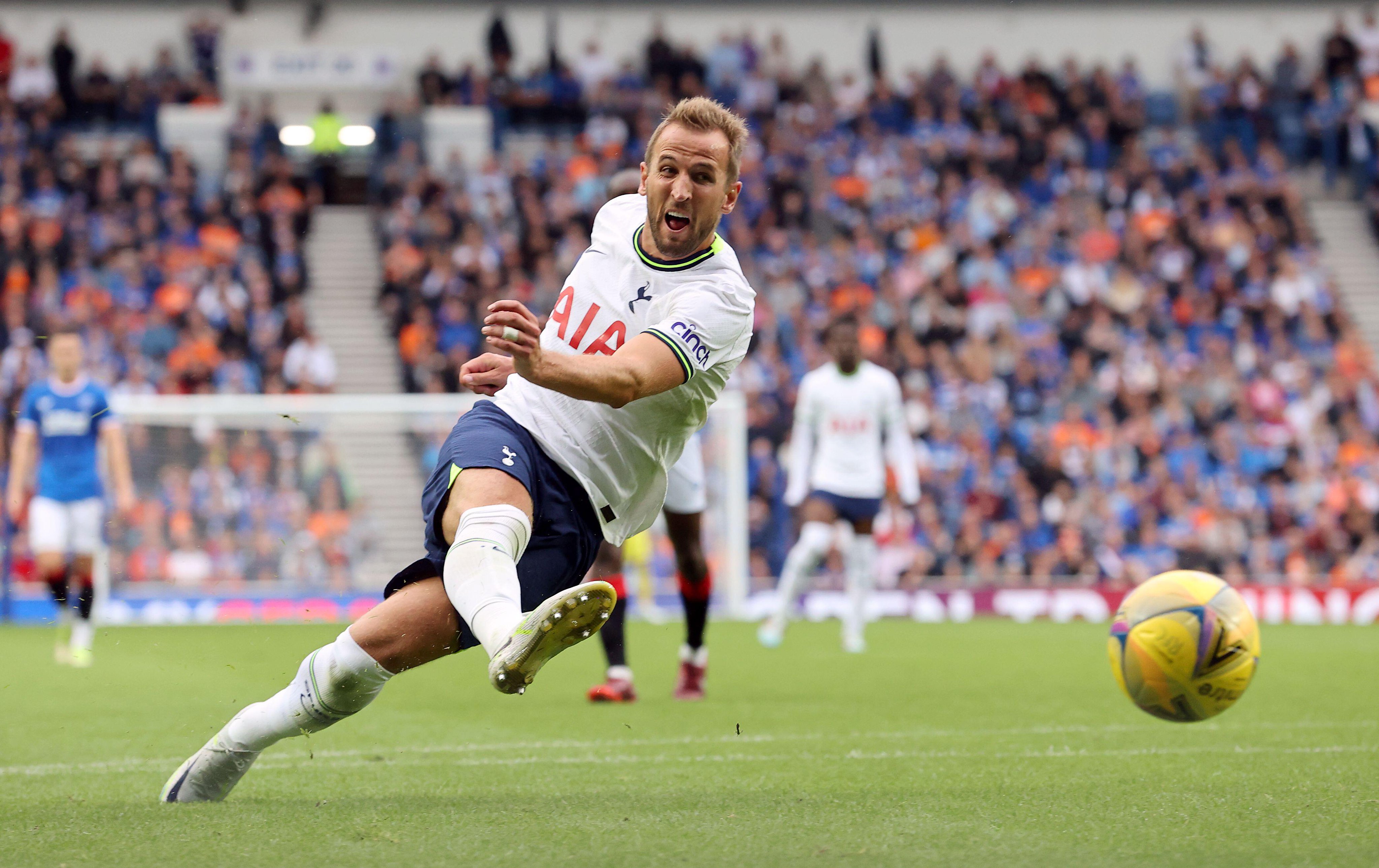  Harry Kane is seen scoring a goal for Tottenham Hotspur against Rangers in the Champions League.