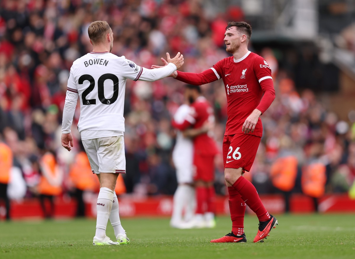 Liverpool's Andrew Robertson shakes hands with West Ham striker Jarrod Bowen