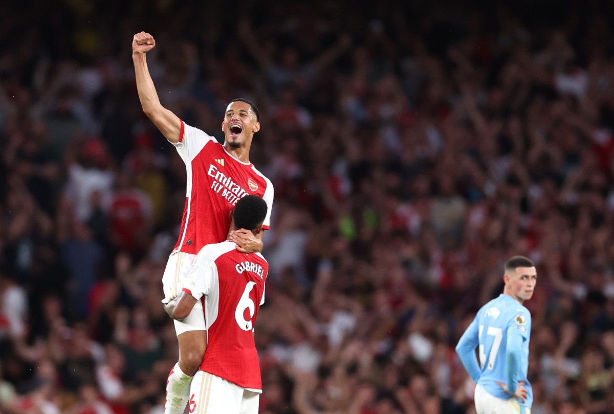 Arsenal's William Saliba celebrating a win over Man City