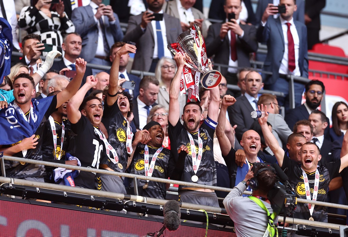 Southampton celebrate winning the play-off final last season