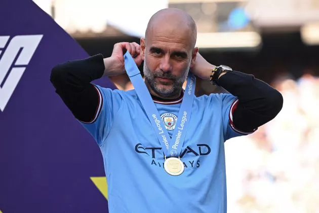 Pep Guardiola pictured in May 2023 with a Premier League winners medal around his neck