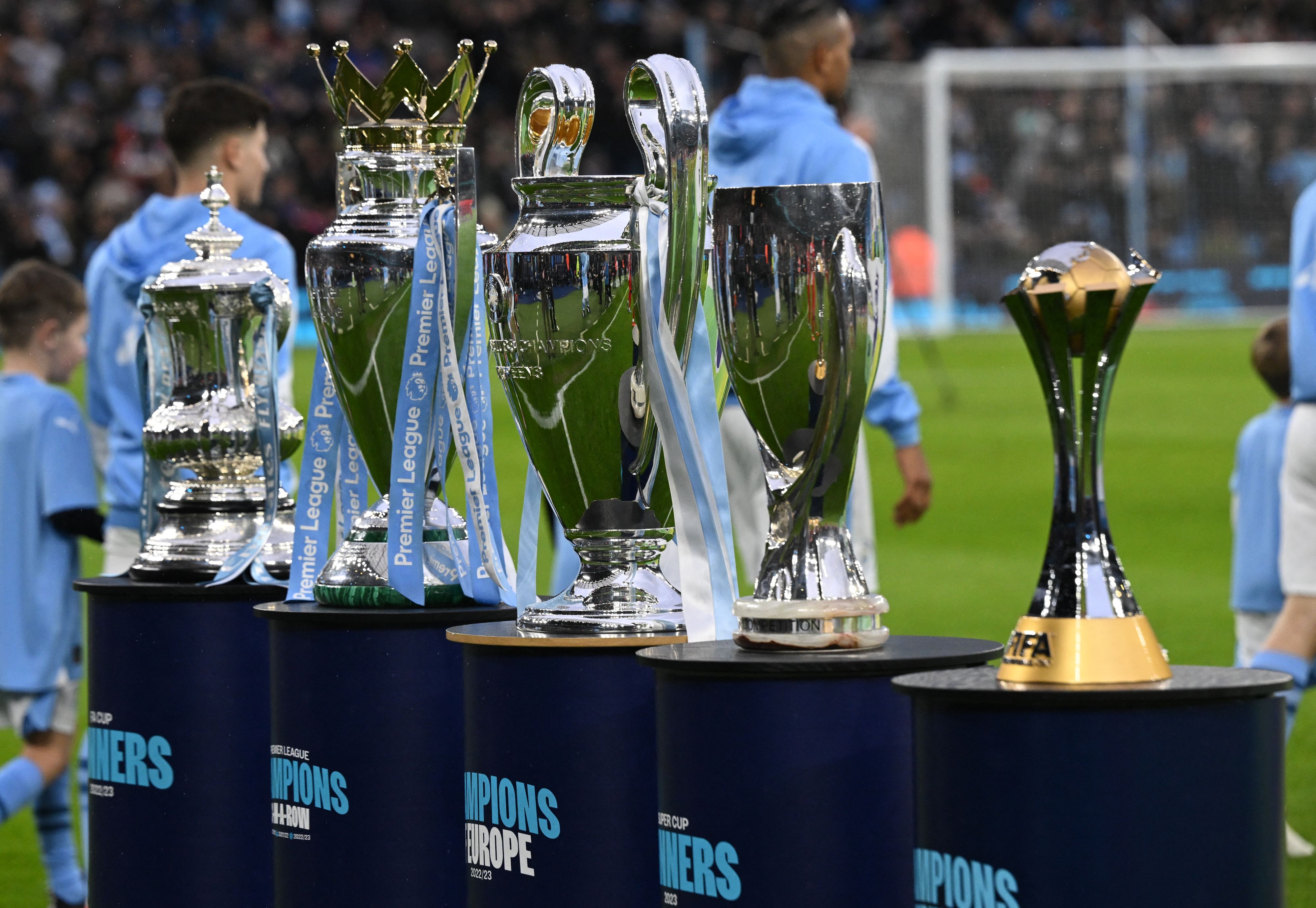 Man City display the five trophies they won in 2023 including one for the Premier League title