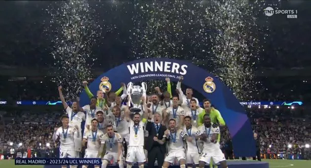 Real Madrid lift the Champions League trophy.