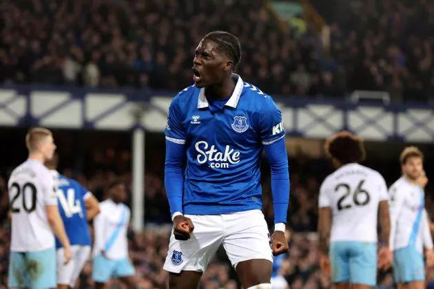 Amadou Onana of Everton celebrates scoring their first goal during the Premier League match between Everton FC and Crystal Palace at Goodison Park on February 19, 2024 in Liverpool, England.