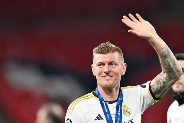 Toni Kroos waves as he celebrates the victory at the end of the UEFA Champions League final football match between Borussia Dortmund and Real Madrid, at Wembley stadium, in London, on June 1, 2024.