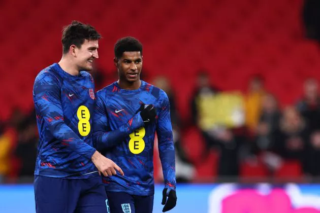 England's defender #06 Harry Maguire (L) and England's striker #11 Marcus Rashford speak prior to the UEFA Euro 2024 Group C qualifying football match between England and Malta, at Wembley stadium, in north London, on November 17, 2023.