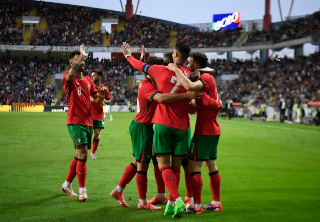 Cristiano Ronaldo celebrates scoring his second goal with teammates during the International friendly match between Portugal and Ireland at the Municipal Stadium in Aveiro, on June 11, 2024