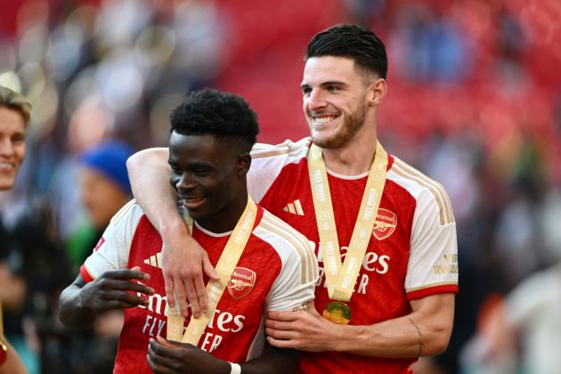 Bukayo Saka and Declan Rice of Arsenal celebrate following the team's victory in the penalty shoot out during The FA Community Shield match between Manchester City against Arsenal at Wembley Stadium on August 06, 2023 in London, England.