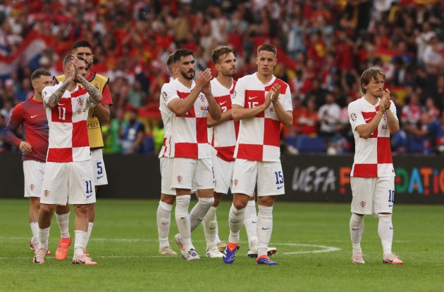 Marcelo Brozovic, Josip Sutalo, Mario Pasalic and Luka Modric of Croatia applaud the fans after the team's defeat in the UEFA EURO 2024 group stage match between Spain and Croatia at Olympiastadion on June 15, 2024 in Berlin, Germany.