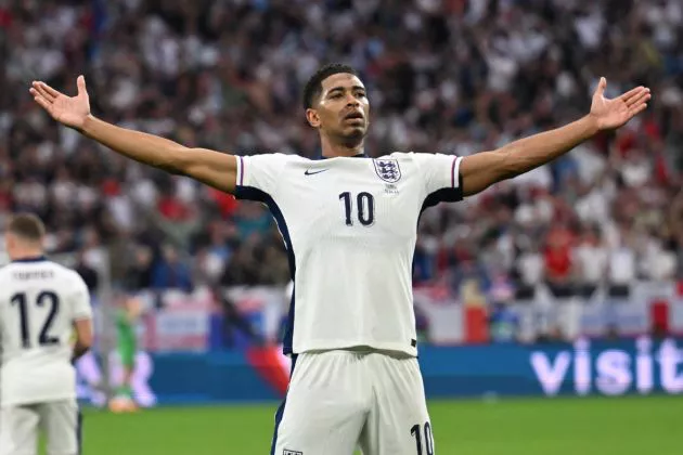 England's midfielder #10 Jude Bellingham celebrates scoring his team's first goal during the UEFA Euro 2024 Group C football match between Serbia and England at the Arena AufSchalke in Gelsenkirchen on June 16, 2024.