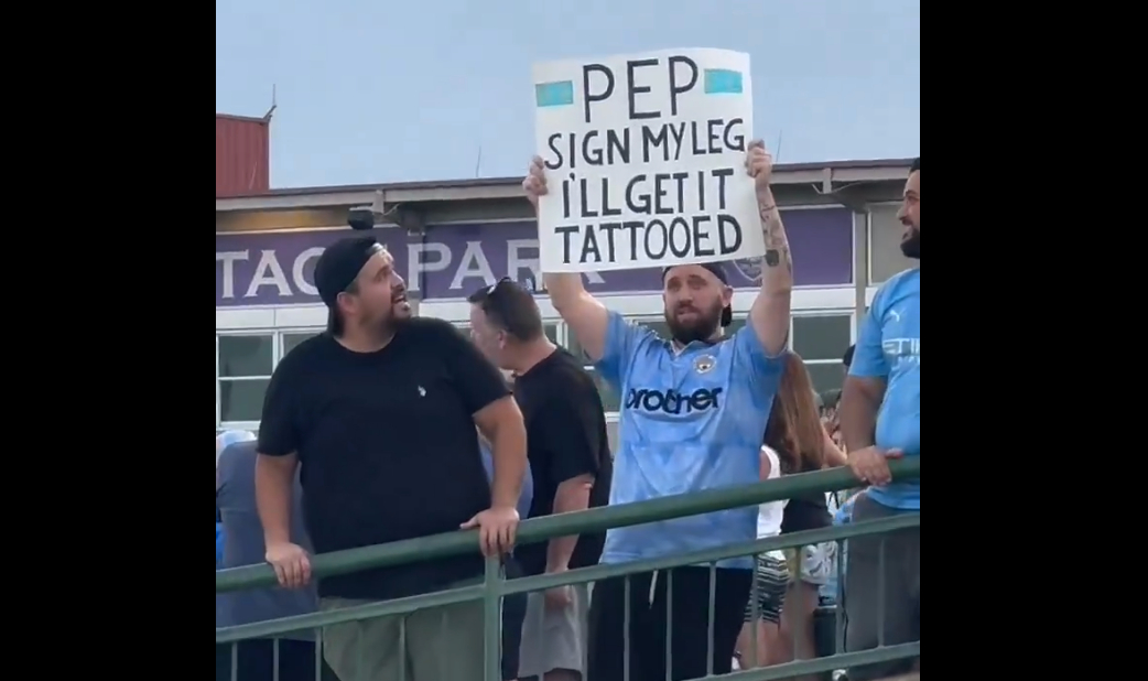 Video: “Your wife is going to kill me” – Pep Guardiola signs Man City fan’s leg in comical exchange