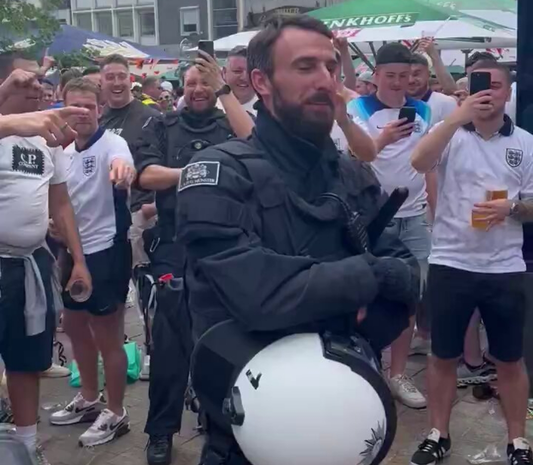 Watch: Hilarious video of England fans serenading Gareth Southgate lookalike German policeman
