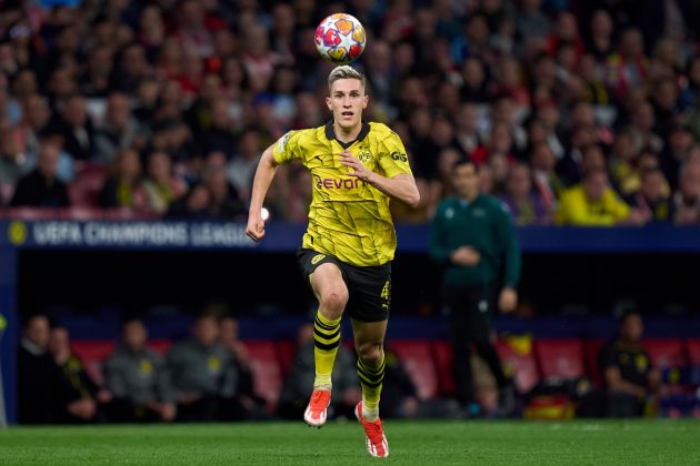 Nico Schlotterbeck of Borussia Dortmund runs for the ball during the UEFA Champions League quarter-final first leg match between Atletico Madrid and Borussia Dortmund at Civitas Metropolitano Stadium on April 10, 2024 in Madrid, Spain.