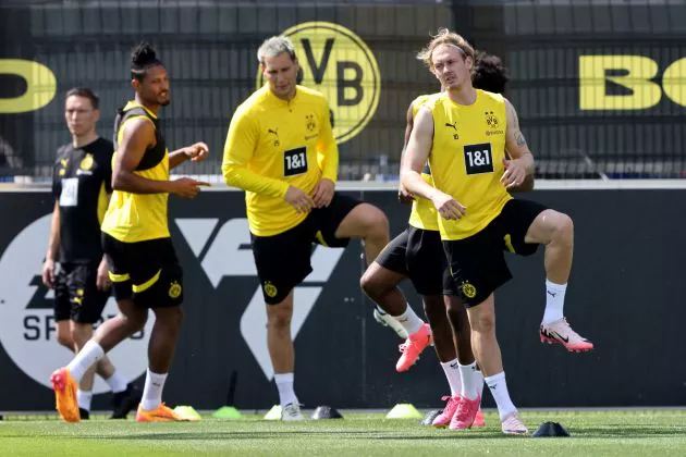 Niklas Suele and Julian Brandt attend the first training session of Borussia Dortmund after the summer break on July 11, 2024 in Dortmund, Germany.