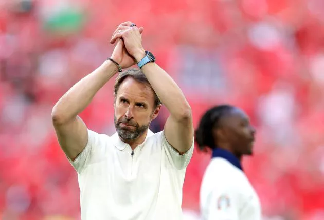 Gareth Southgate, Head Coach of England, acknowledges the fans after his teams victory in the penalty shoot out during the UEFA EURO 2024 quarter-final match between England and Switzerland at Düsseldorf Arena on July 06, 2024.