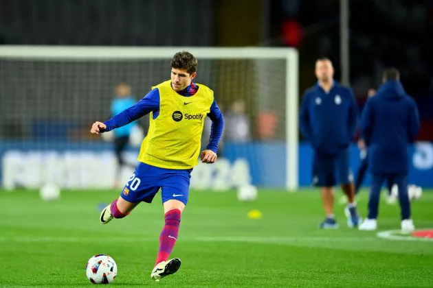 Sergi Roberto warms up before the start of the Spanish league football match between FC Barcelona and UD Las Palmas at the Estadi Olimpic Lluis Companys in Barcelona on March 30, 2024.