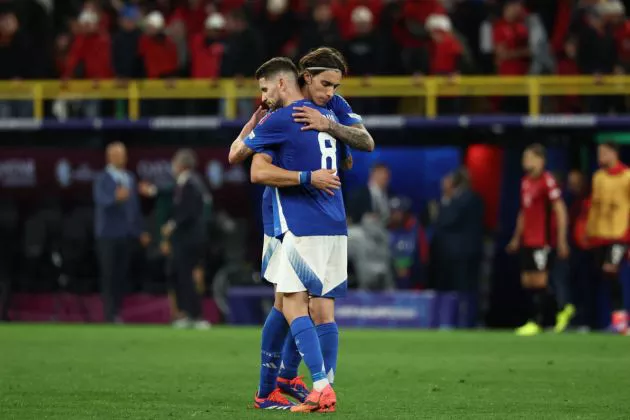 Italy's midfielder #08 Jorginho and Italy's defender #05 Riccardo Calafiori celebrate after winning the UEFA Euro 2024 Group B football match between Italy and Albania at the BVB Stadion in Dortmund on June 15, 2024.