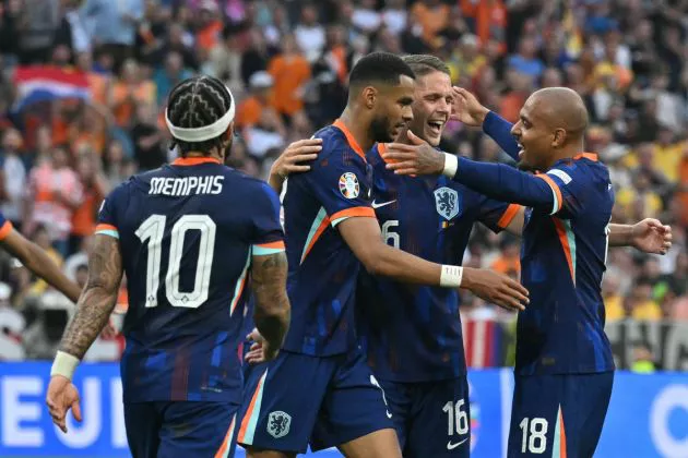 Donyell Malen celebrates with Netherlands' midfielder #16 Joey Veerman and Netherlands' forward #11 Cody Gakpo after scoring his team's second goal during the UEFA Euro 2024 round of 16 football match between Romania and the Netherlands.