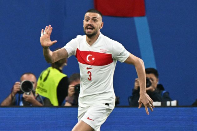 Merih Demiral celebrates after scoring the opening goal during the UEFA Euro 2024 round of 16 football match between Austria and Turkey at the Leipzig Stadium in Leipzig on July 2, 2024.