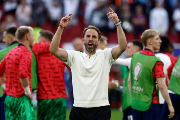 England's head coach Gareth Southgate celebrates at the end of the penalty shootout as his team wins the UEFA Euro 2024 quarter-final football match between England and Switzerland at the Duesseldorf Arena in Duesseldorf on July 6, 2024.