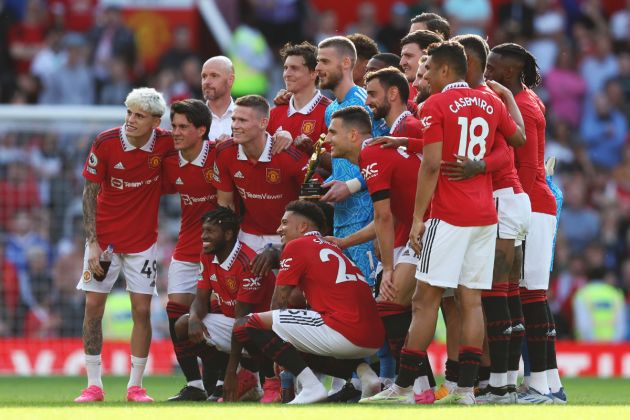 David De Gea of Manchester United poses for a photo with teammates after being presented with the Premier League Golden Glove award following the Premier League match between Manchester United and Fulham FC at Old Trafford on May 28, 2023.